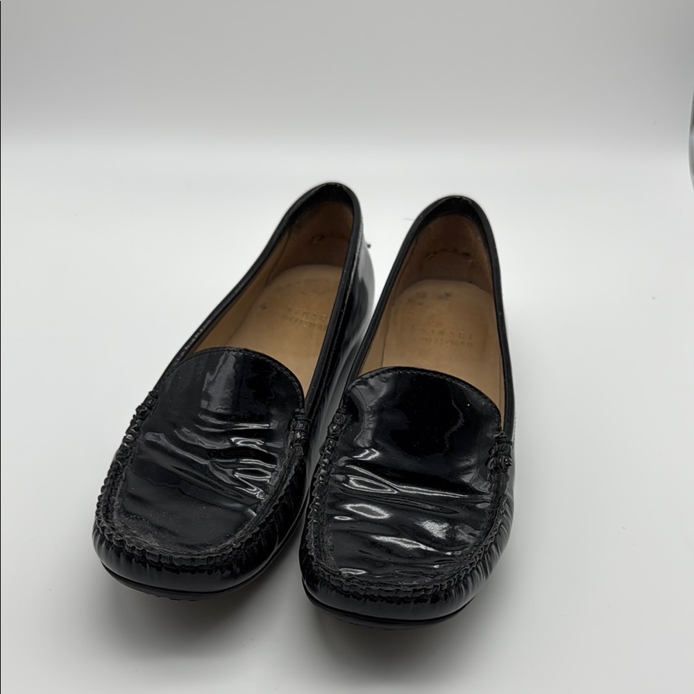 Stuart Weitzman Glossy Black Moccasins